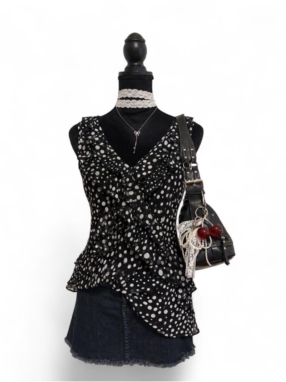Black polka dot ruffle top